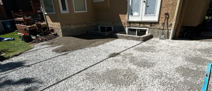 Professional hardscaping base installation depth Calgary freeze-thaw