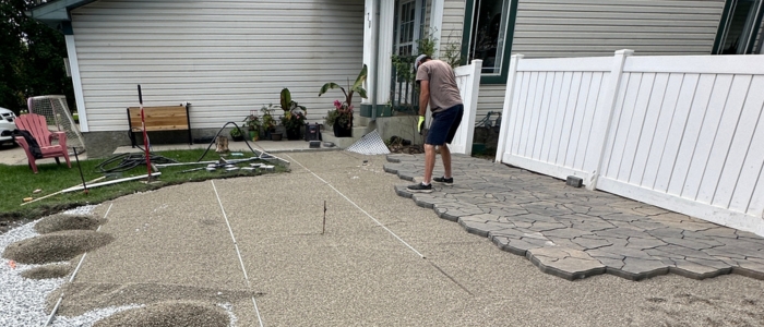 Freeze-thaw resistant paving stone installation Calgary hardscaping