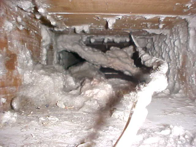 Heavily clogged and dirty air ventilation duct.