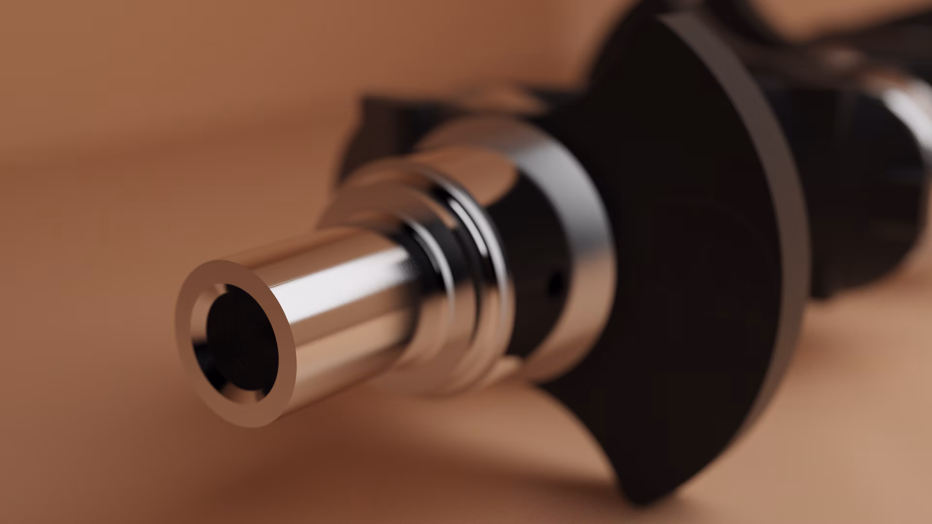 A realistic visualization of a 3D-designed crankshaft focused on specific features of the crankshaft.