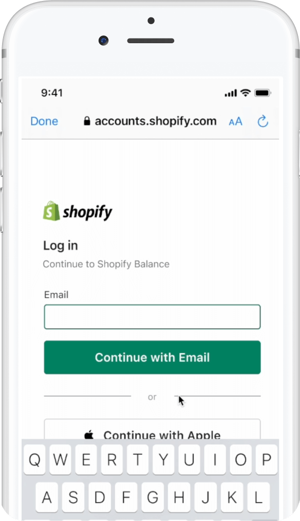 Mobile phone showing Shopify login 