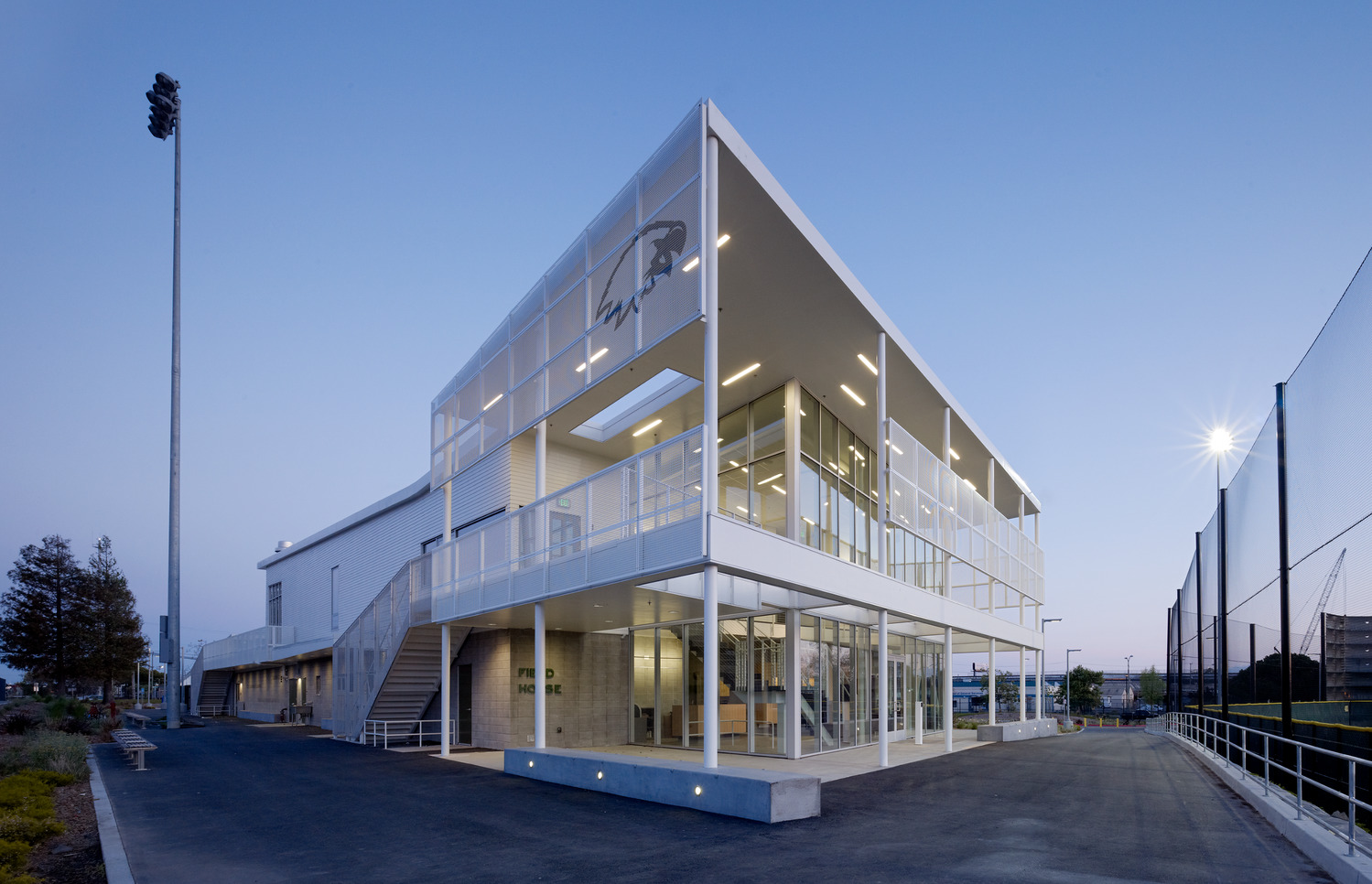 exterior view of field house at dusk