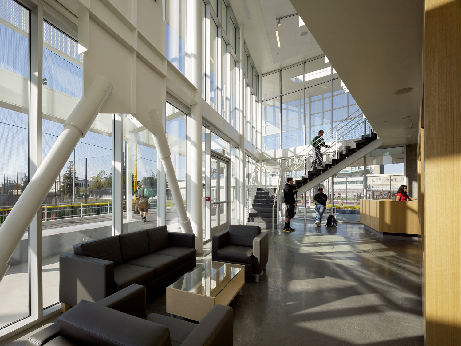 seating area near floor-to-ceiling windows in field house
