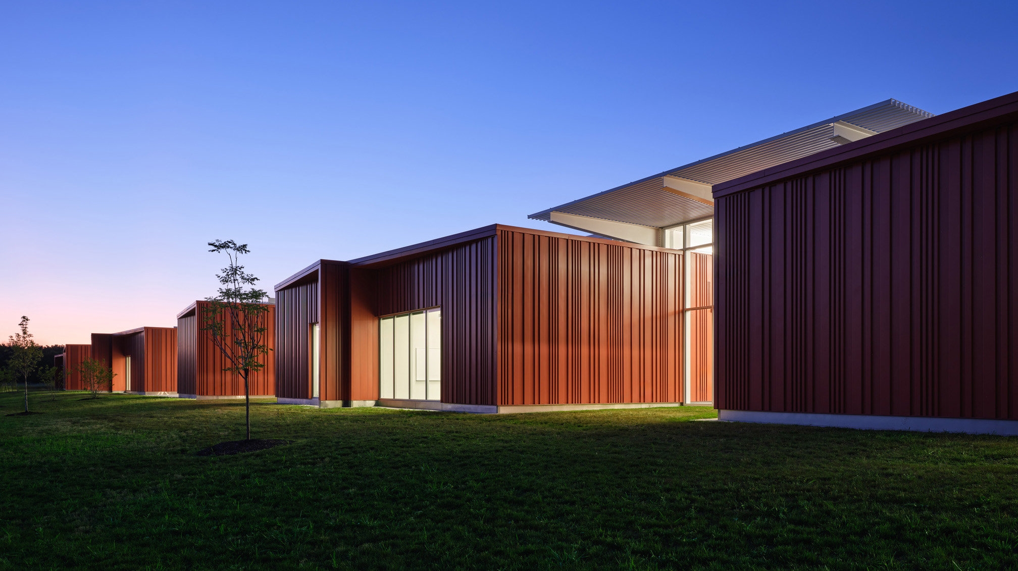 Exterior view of middle school at dusk.