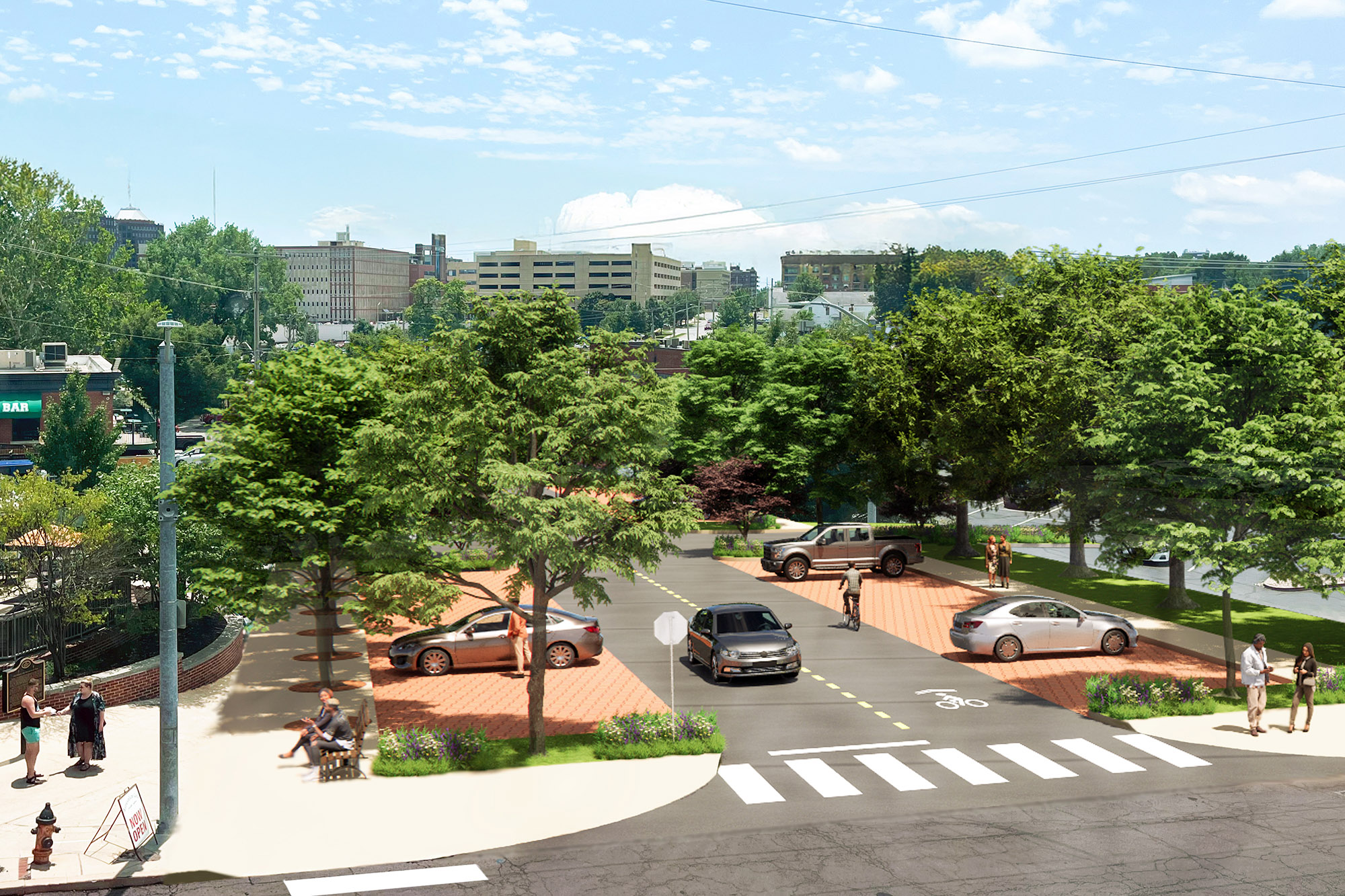 An aerial view of Mill Street featuring permeable pavers and tree canopy.