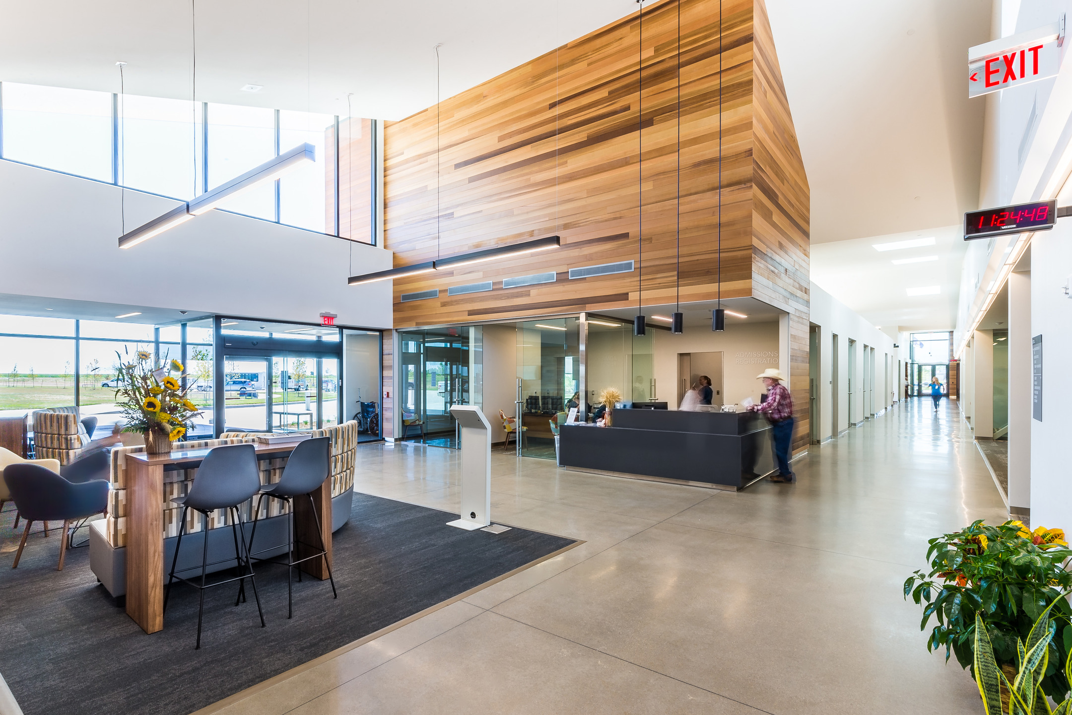 The Patterson Health Center lobby features tall windows that keep the open space brightly lit.
