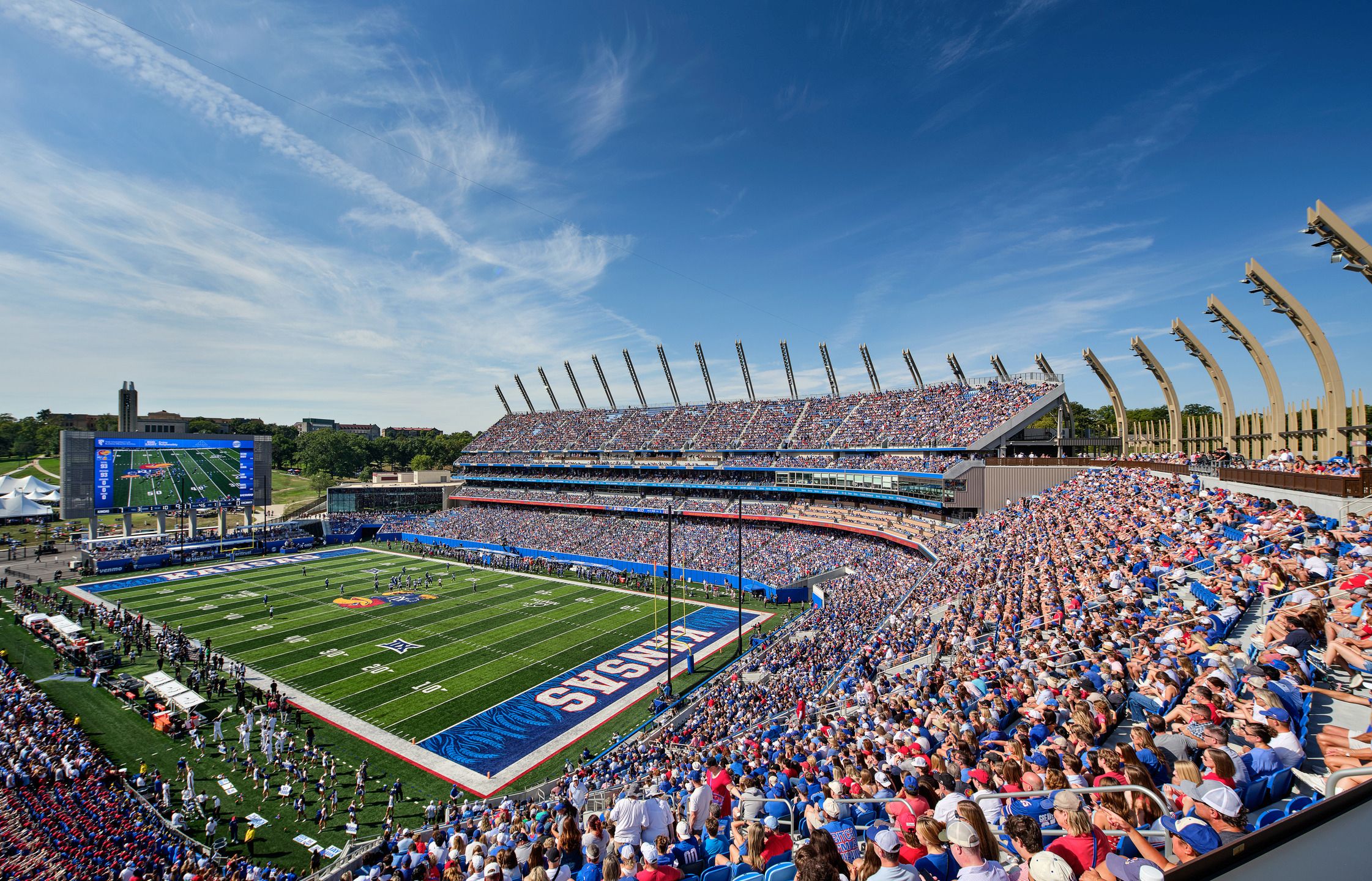 Photo of the David Booth Memorial Stadium with fans in stands.