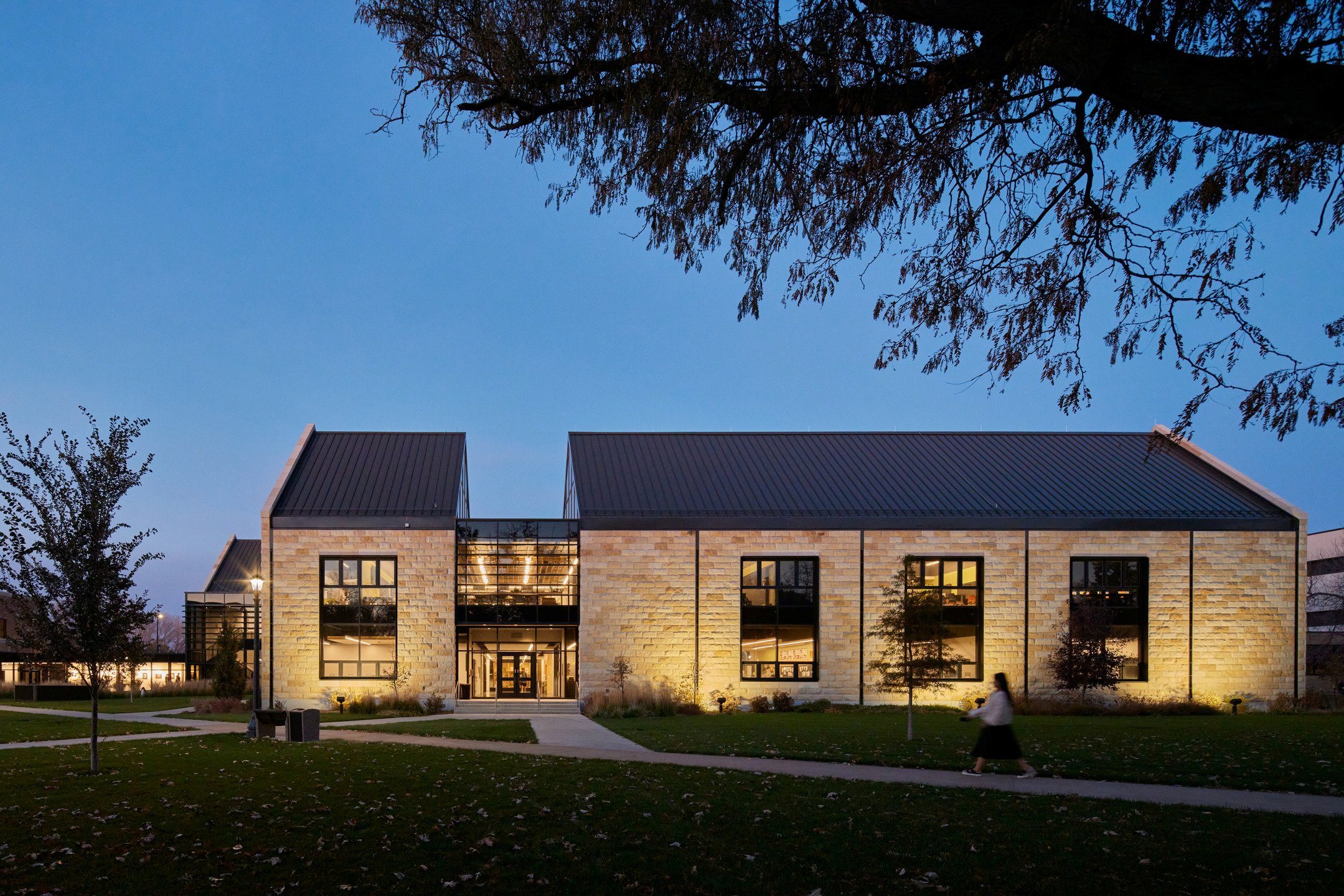 Exterior dusk photo of the Schmidt Foundation Center for Art & Design at Fort Hays State University taken from the main quad.
