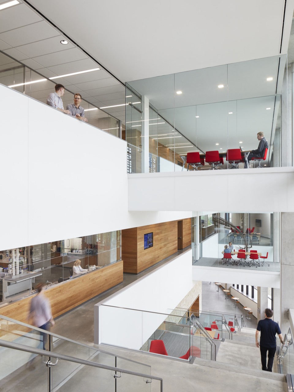 Image of the Slawson Hall atrium and central circulation connecting three levels.