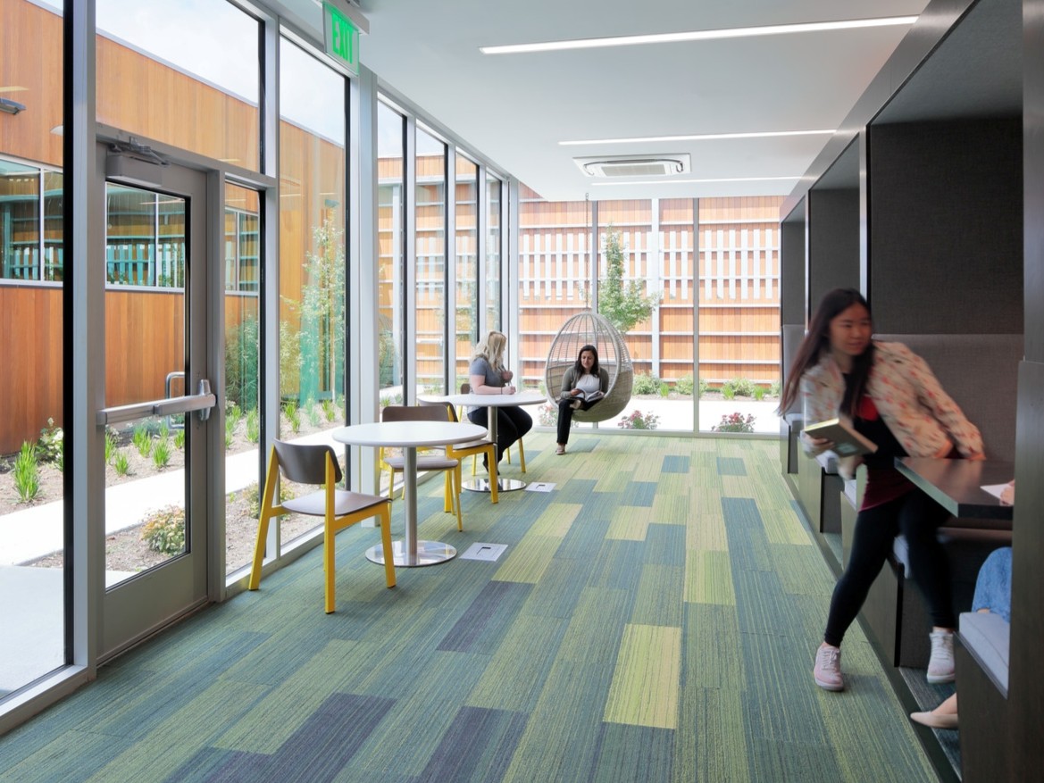 Students at KCU study in personal and group pod spaces. 