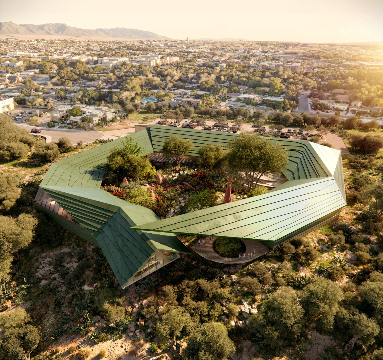 A render shows an aerial view of the New Mexico Literacy Institute.