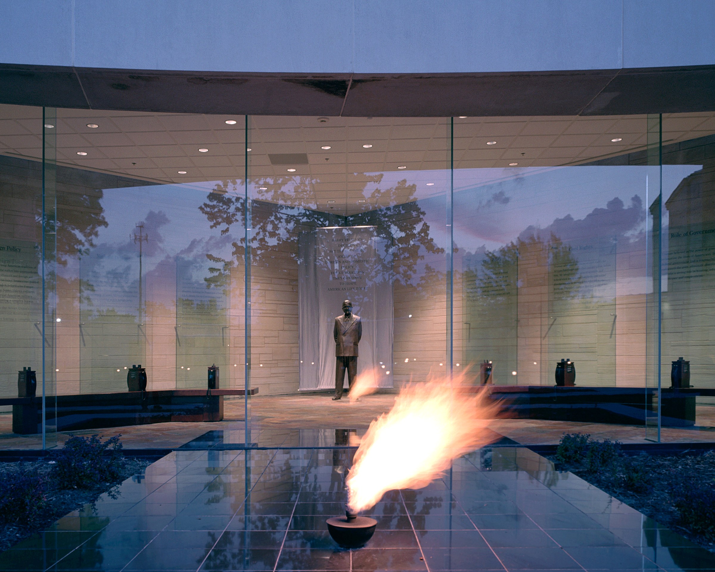 In the Legacy Gallery, a life-sized bronze statue of Truman gazes out onto the relocated Eternal Flame.