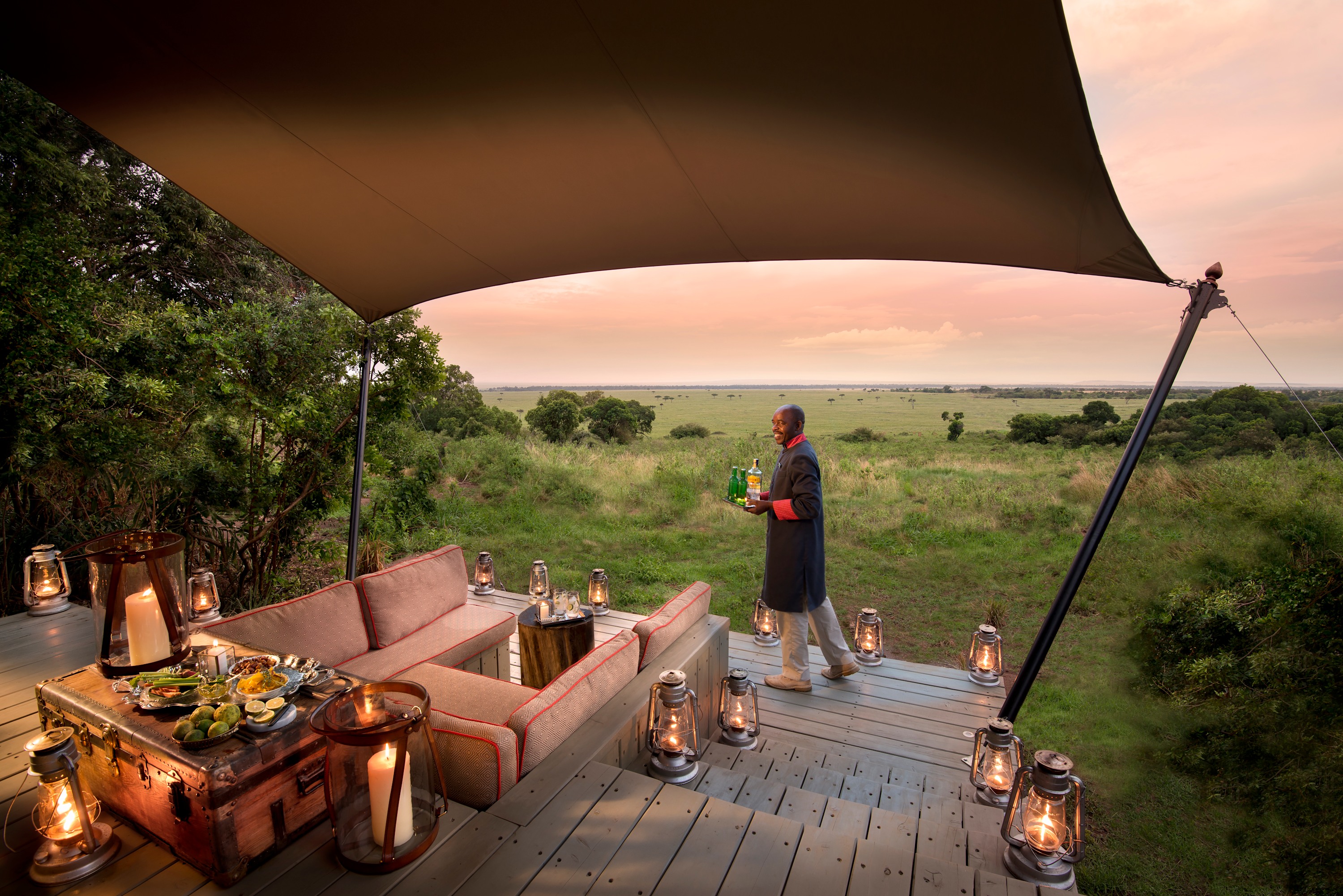 The candlelight atmosphere on a private terrace in the Masai Mara