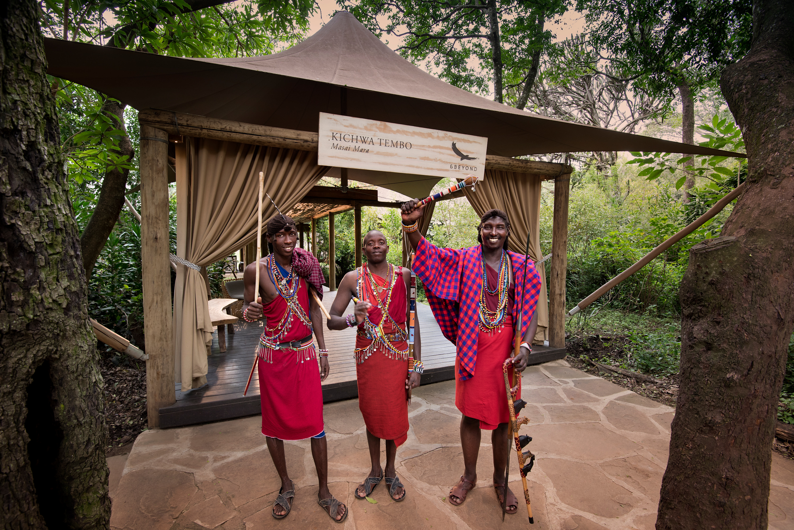 Traditional Masai welcoming guests on a luxury safari
