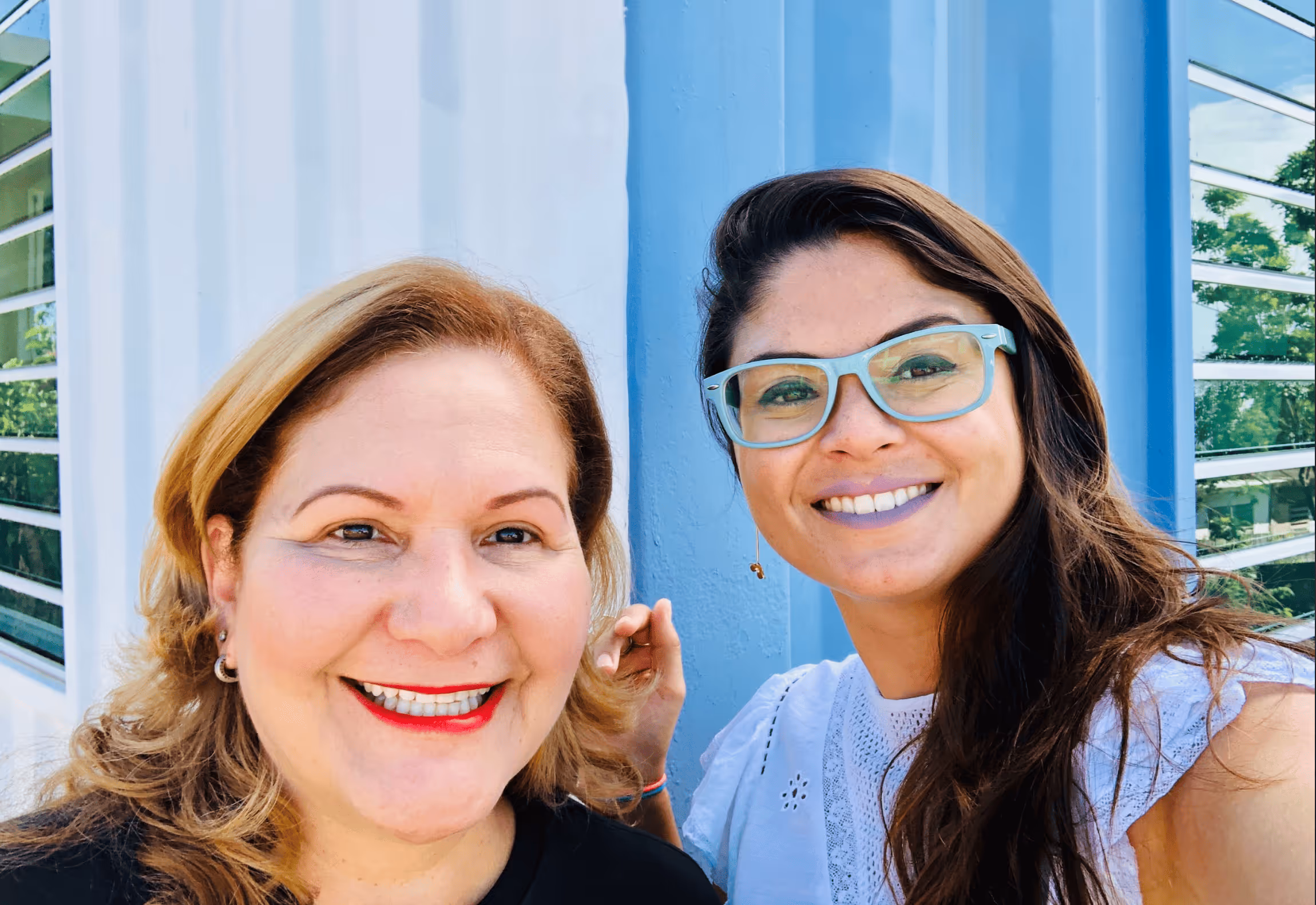 Mildred Díaz and Carla Gautier smiling.