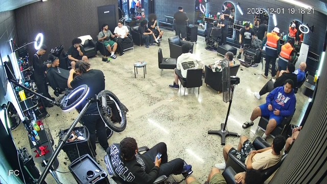 Three girls standing together smiling and making peace signs