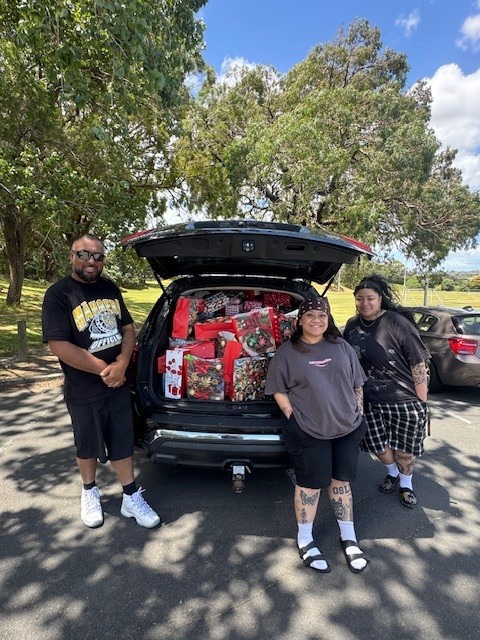 Two men smiling side by side