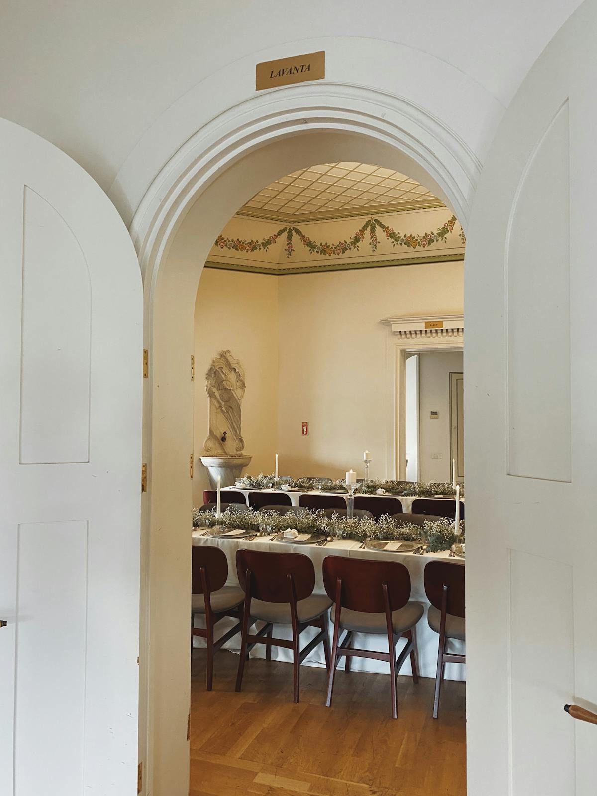 Wedding couple at venue entrance