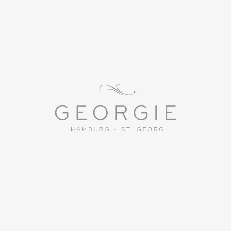 Logo of the hair salon georgie in hamburg - lange reihe