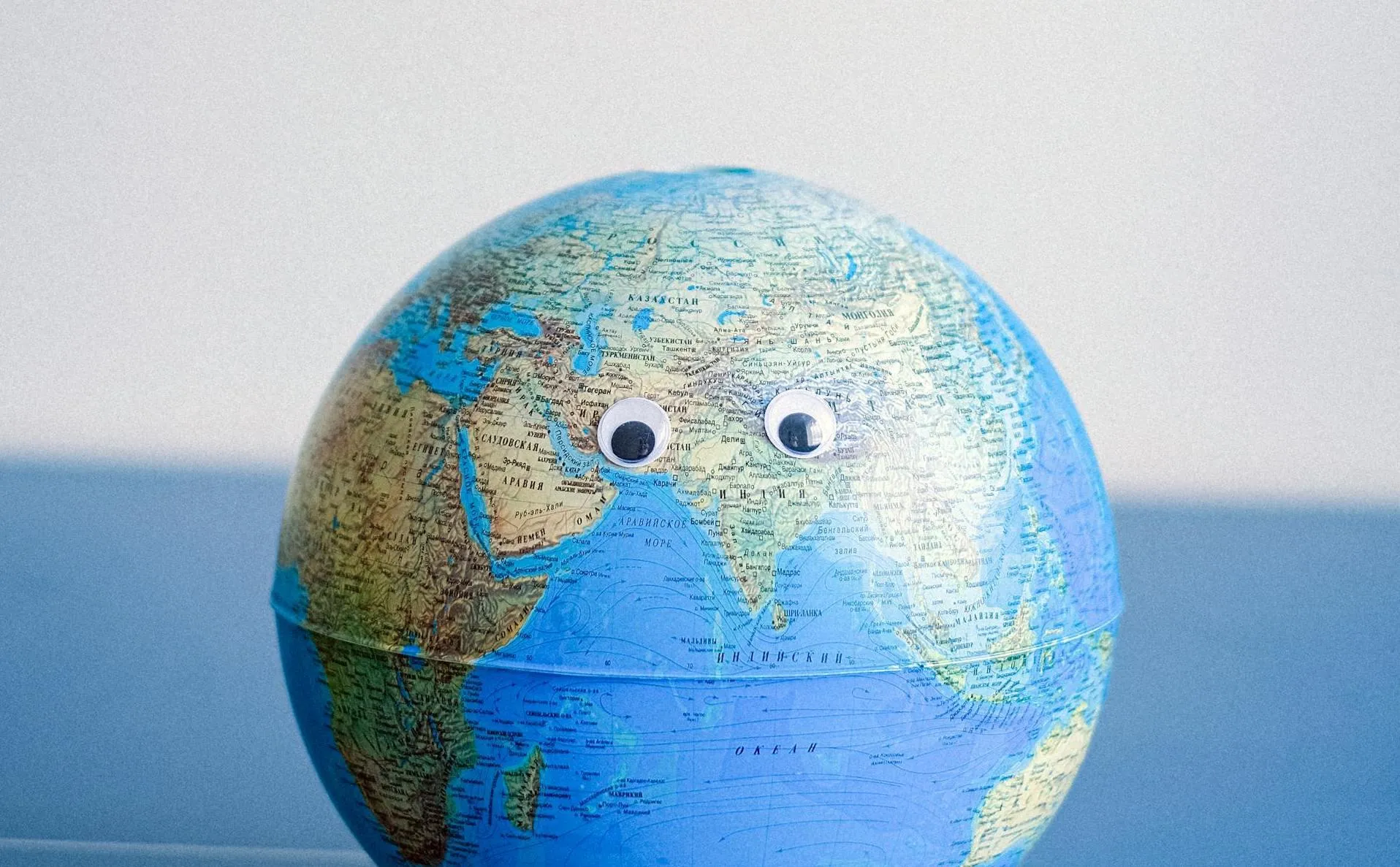 A world globe with googly eyes.