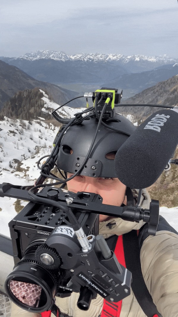 Camera man standing on gondola