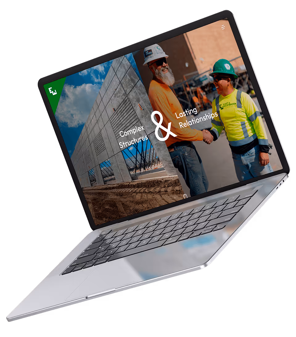 Laptop displaying an image split between a concrete structure under construction and two construction workers shaking hands, with text 'Complex Structures & Lasting Relationships'.