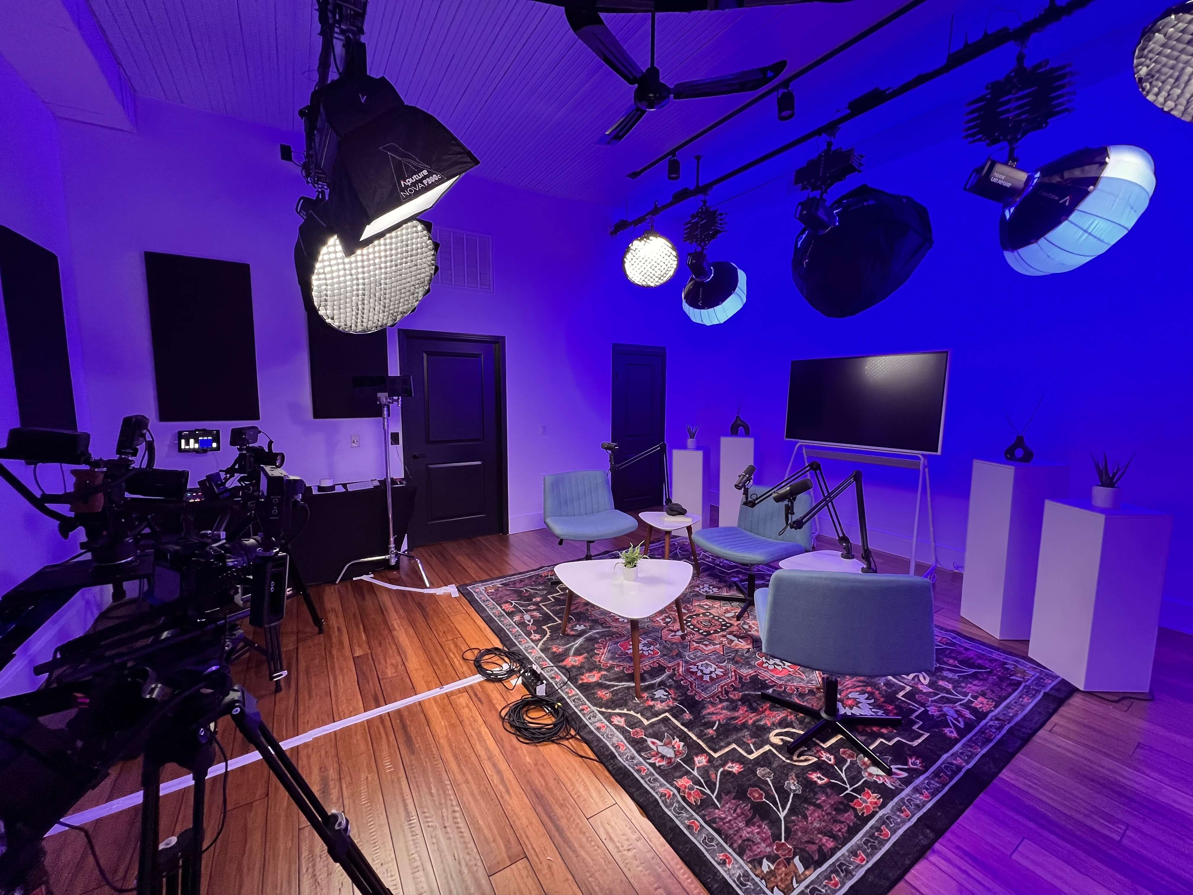 Two people reviewing and analyzing printed business charts and graphs on a table.