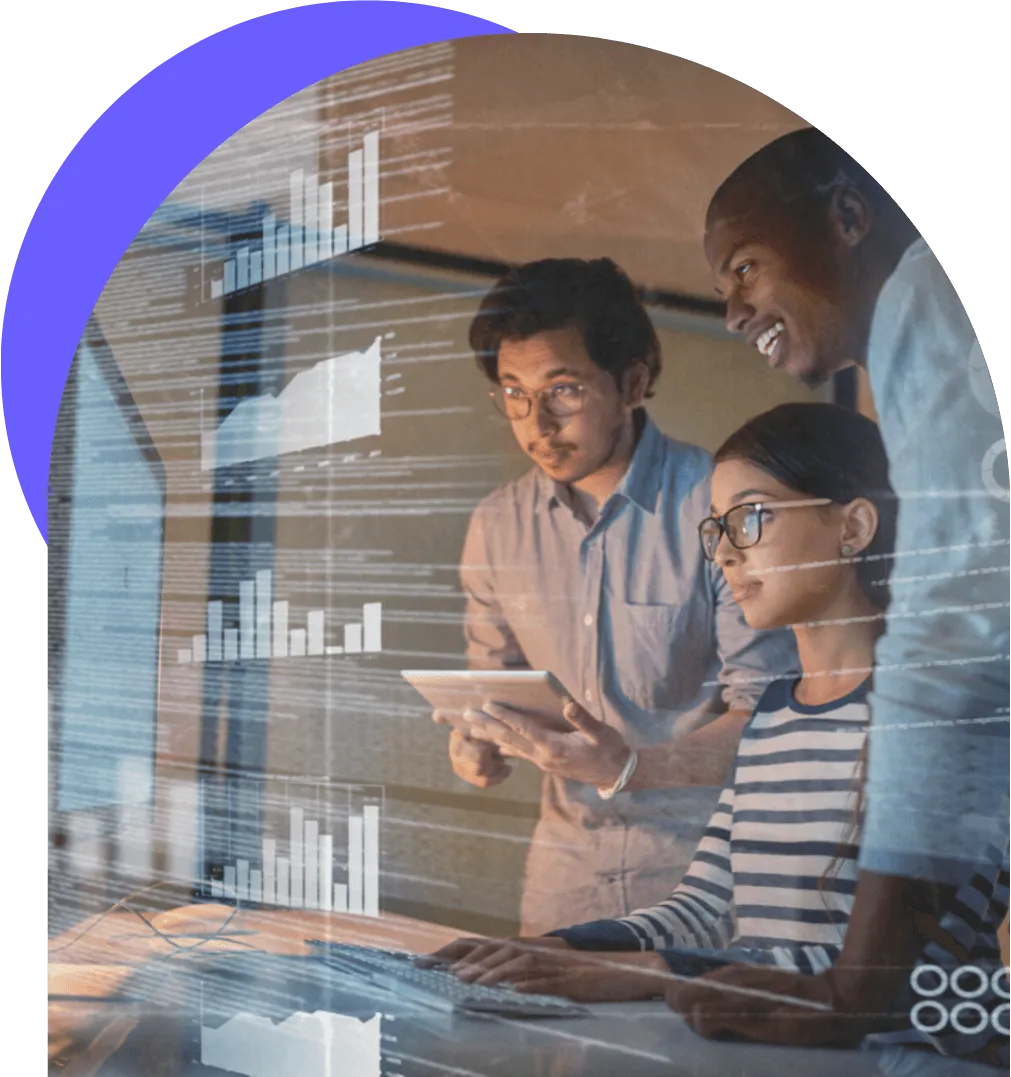 Three people looking at a computer screen with graphs and data.