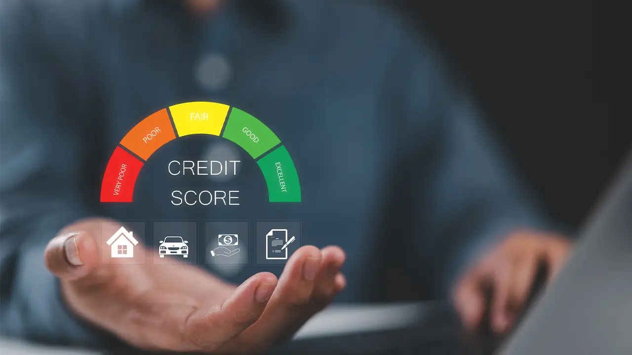 A person holding a digital credit score gauge showing ratings from very poor to excellent, representing the importance of regular credit report checks for financial health.