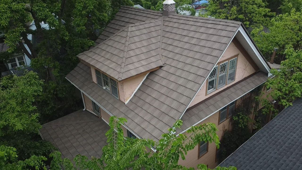 Westlake stone-coated steel roof installed by Storm Master Roofing in Minneapolis