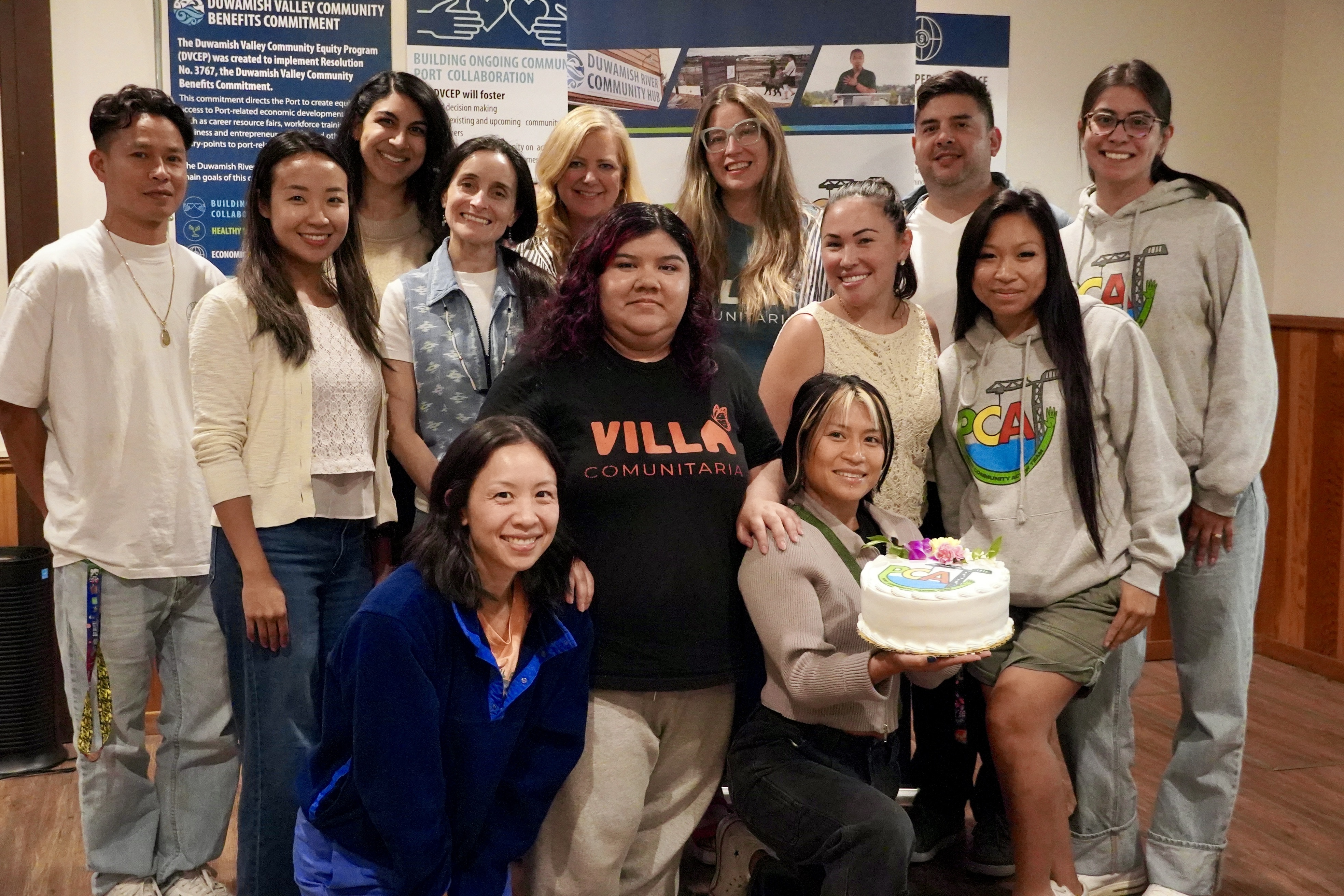 Small group of people smiling at camera