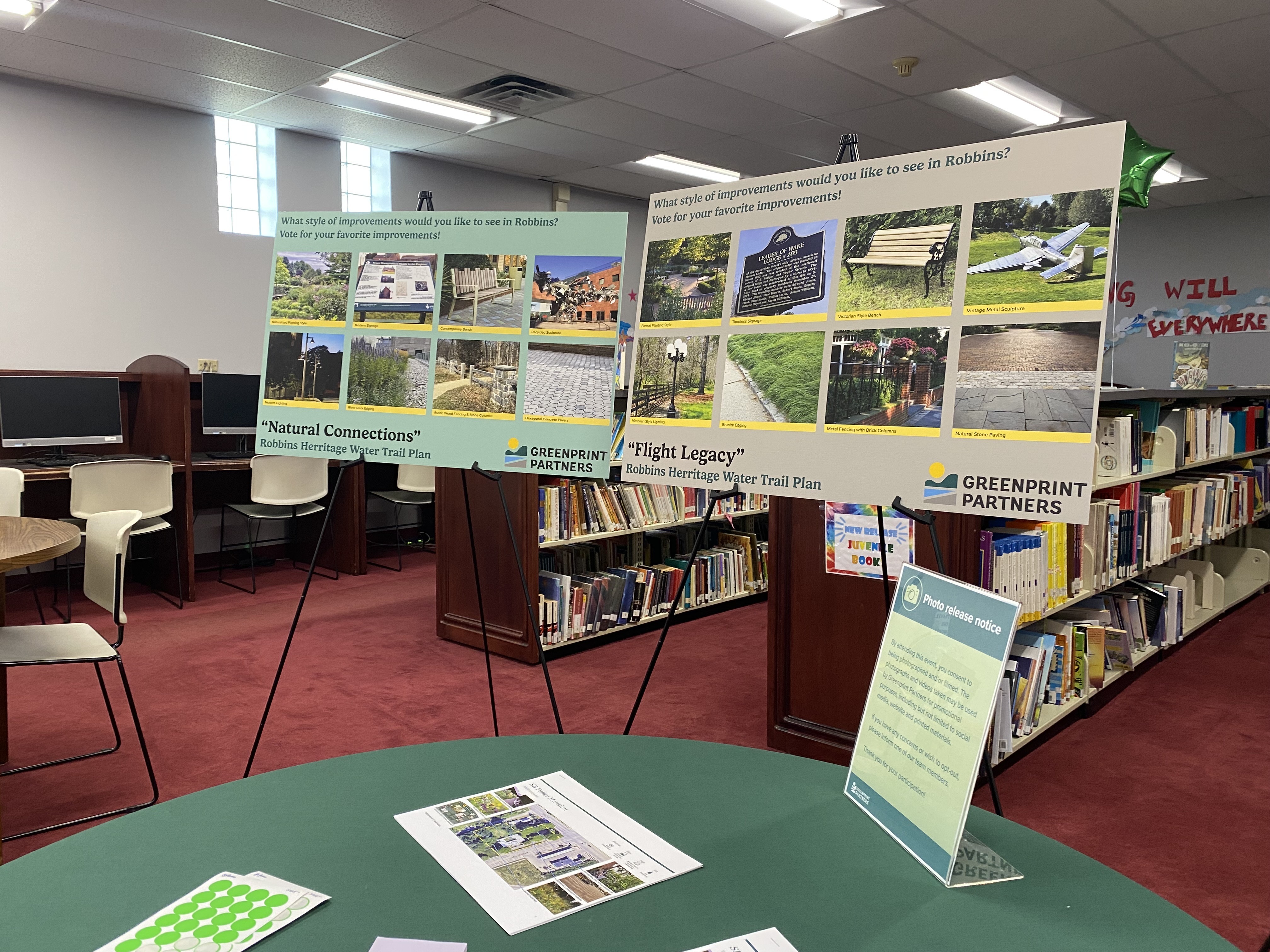 Poster boards on display at the local library to invite community feedback on the Robbins Heritage Trail Plan