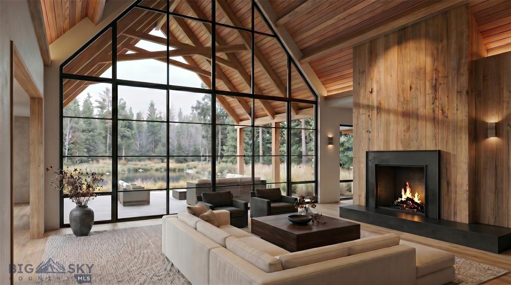 Vaulted great room with full-height glass and fireplace