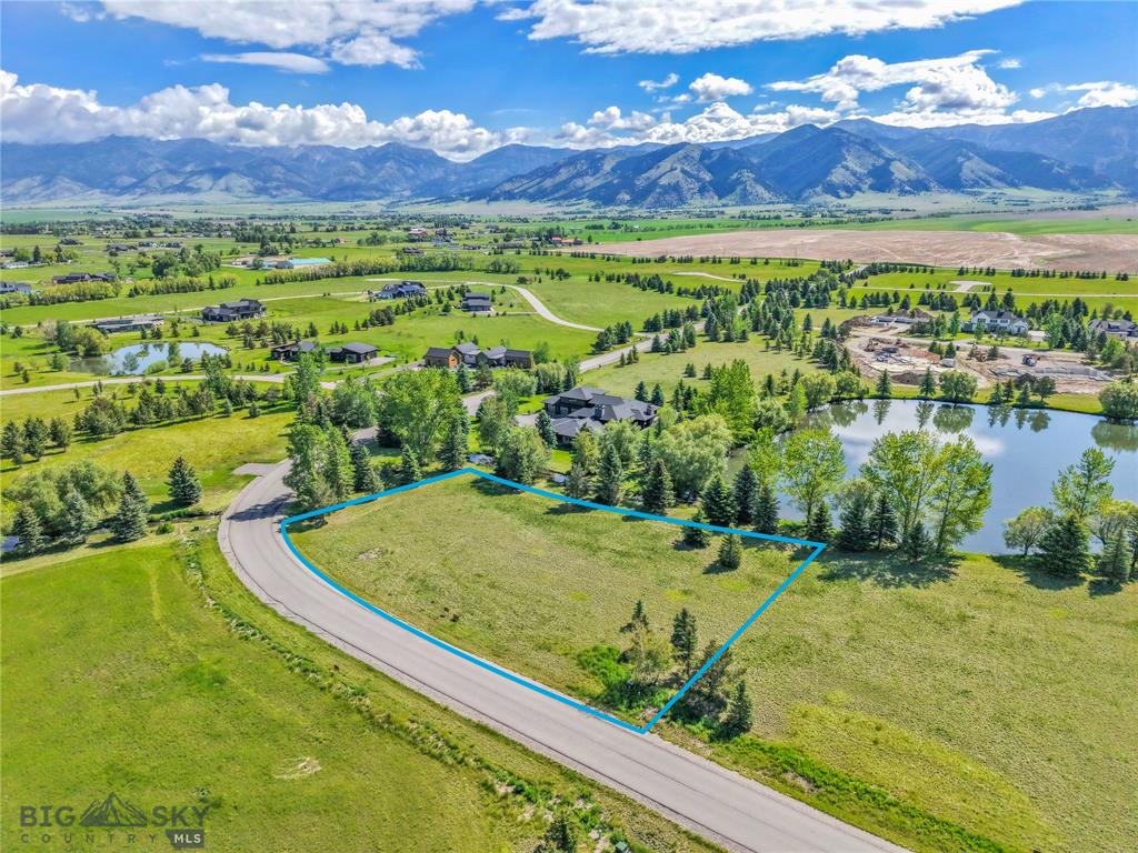 Aerial of the 1.03 acre lot with Bridger Range beyond