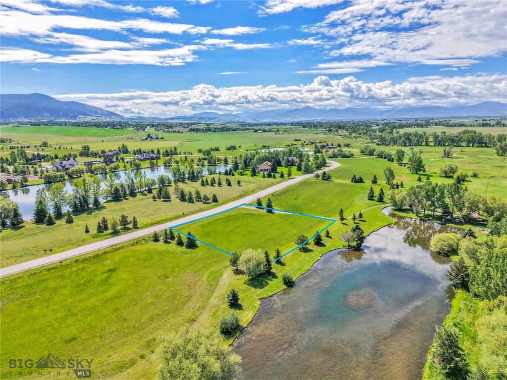 The 1.05 acre lot bordering Dragonfly Pond at Bridger Lake Meadows