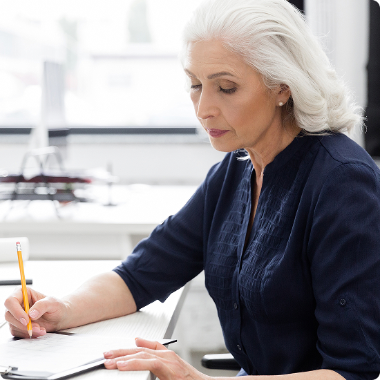 Woman reviewing her financial plan