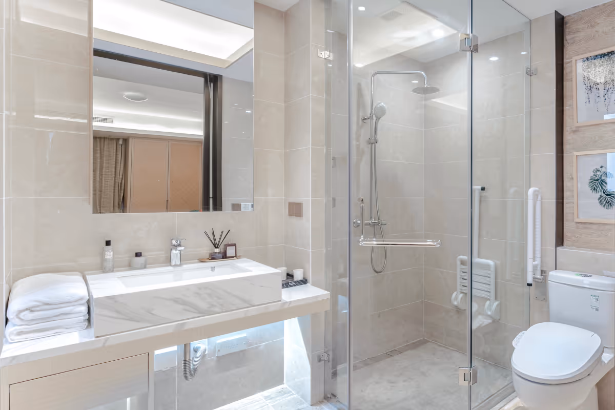 bathroom with walk-in shower and accessibility features