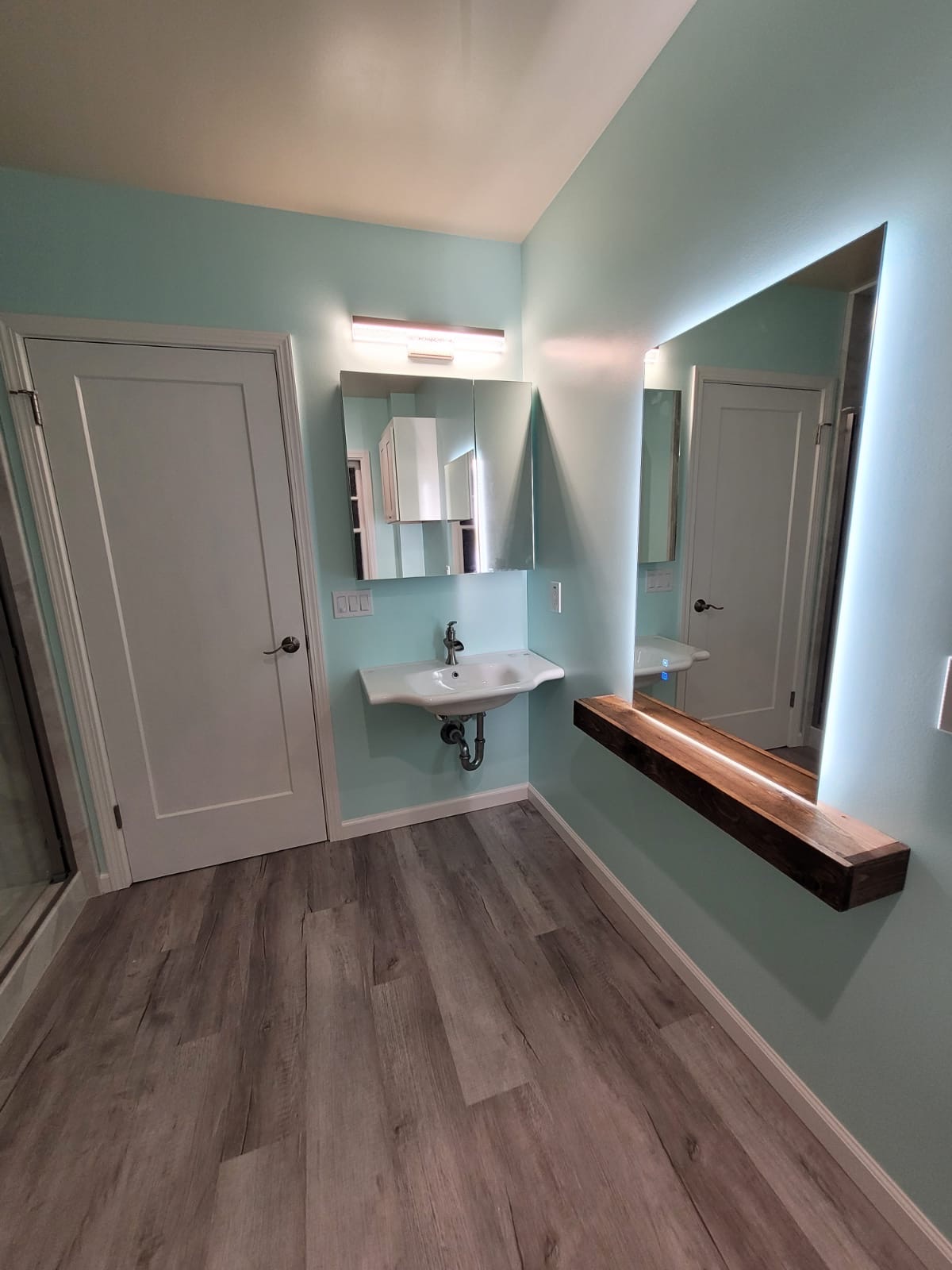 coastal bathroom with sea-glass colored walls