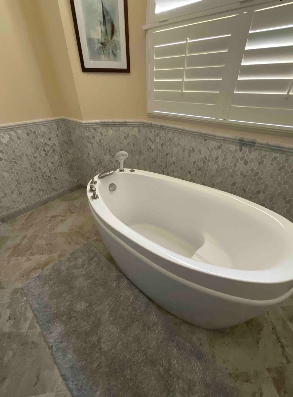 Coastal Inspired Bathroom with a freestanding tub