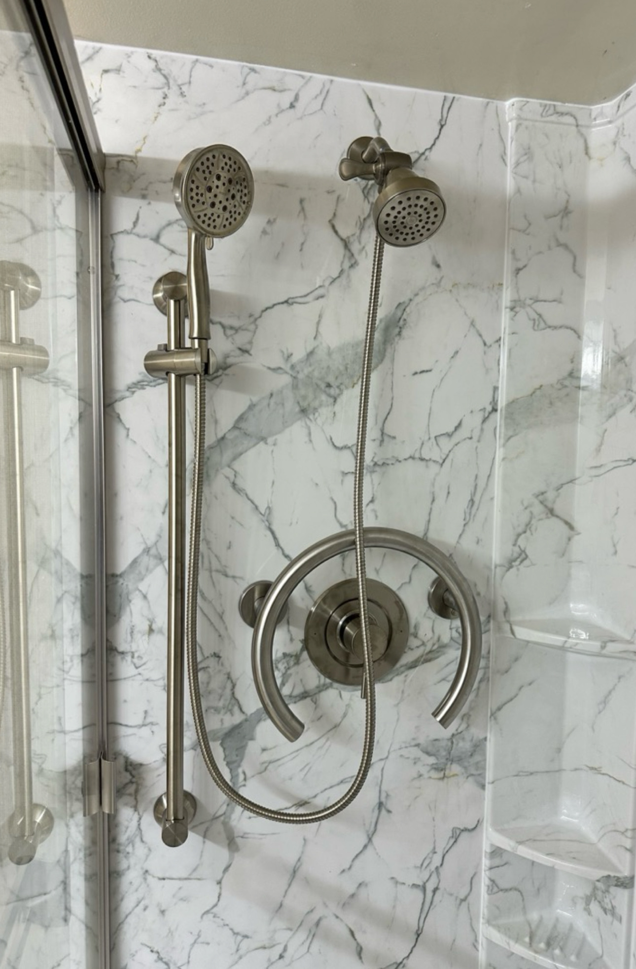 duel shower heads with handheld shower head