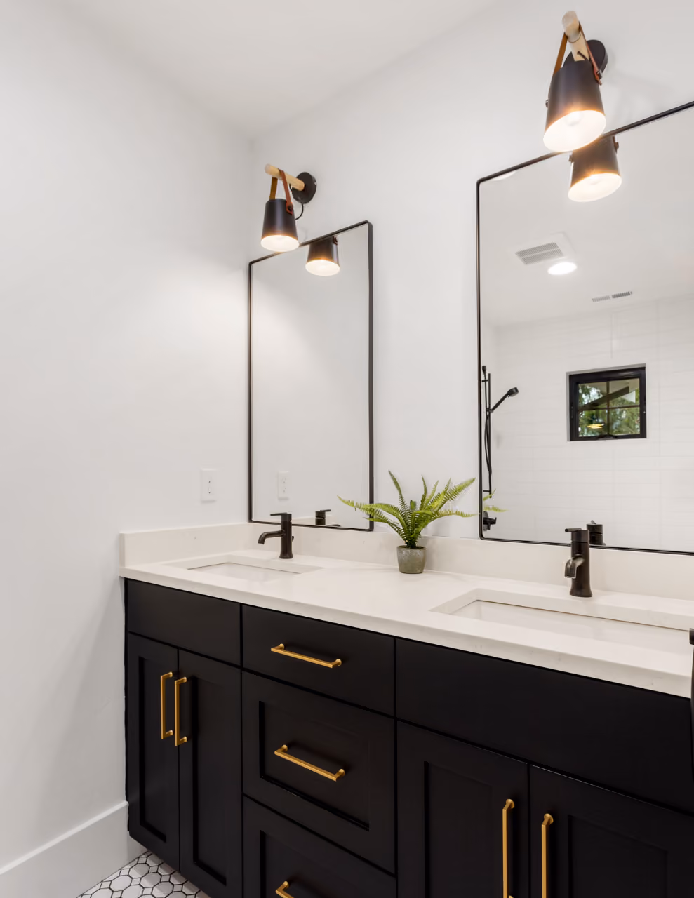 black bathroom vanity with white walls