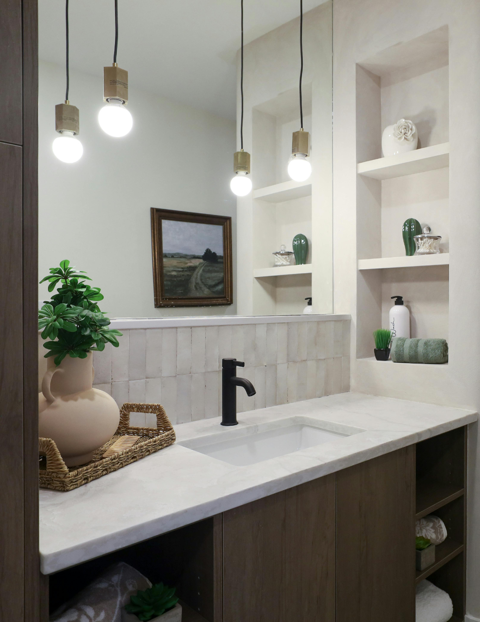 bathroom vanity with handing light fixtures  