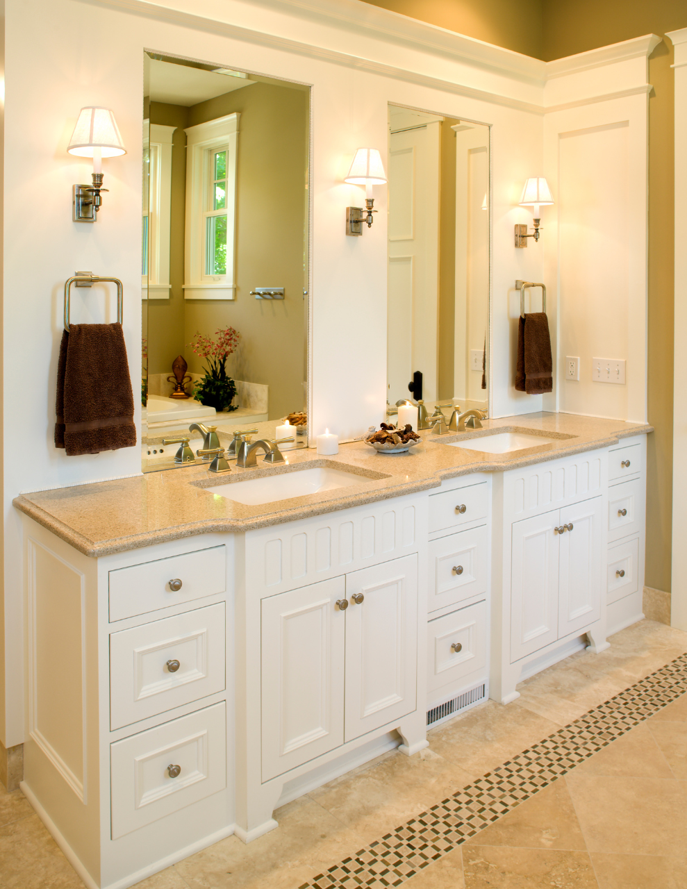 double bathroom vanity lighting with sconces in between mirror and outside of mirrors 