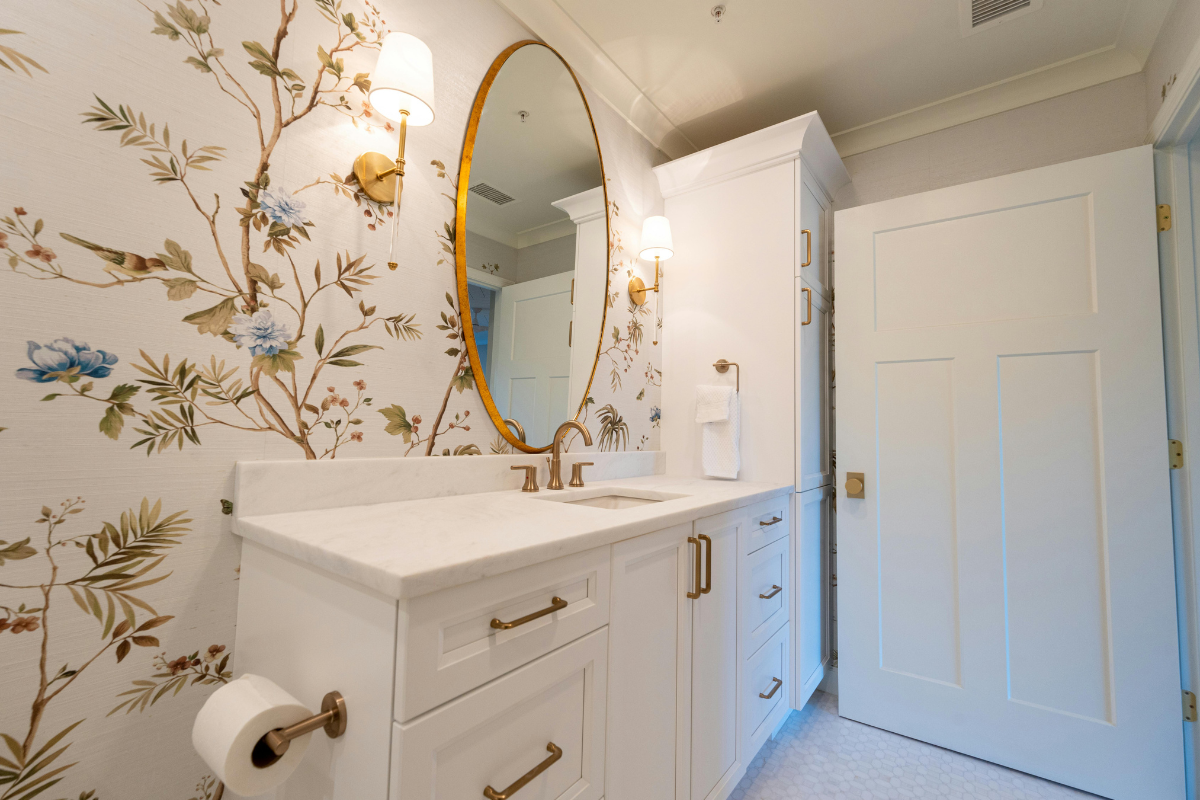 bathroom vanity with fabric lamp sconces on both sides of mirror 