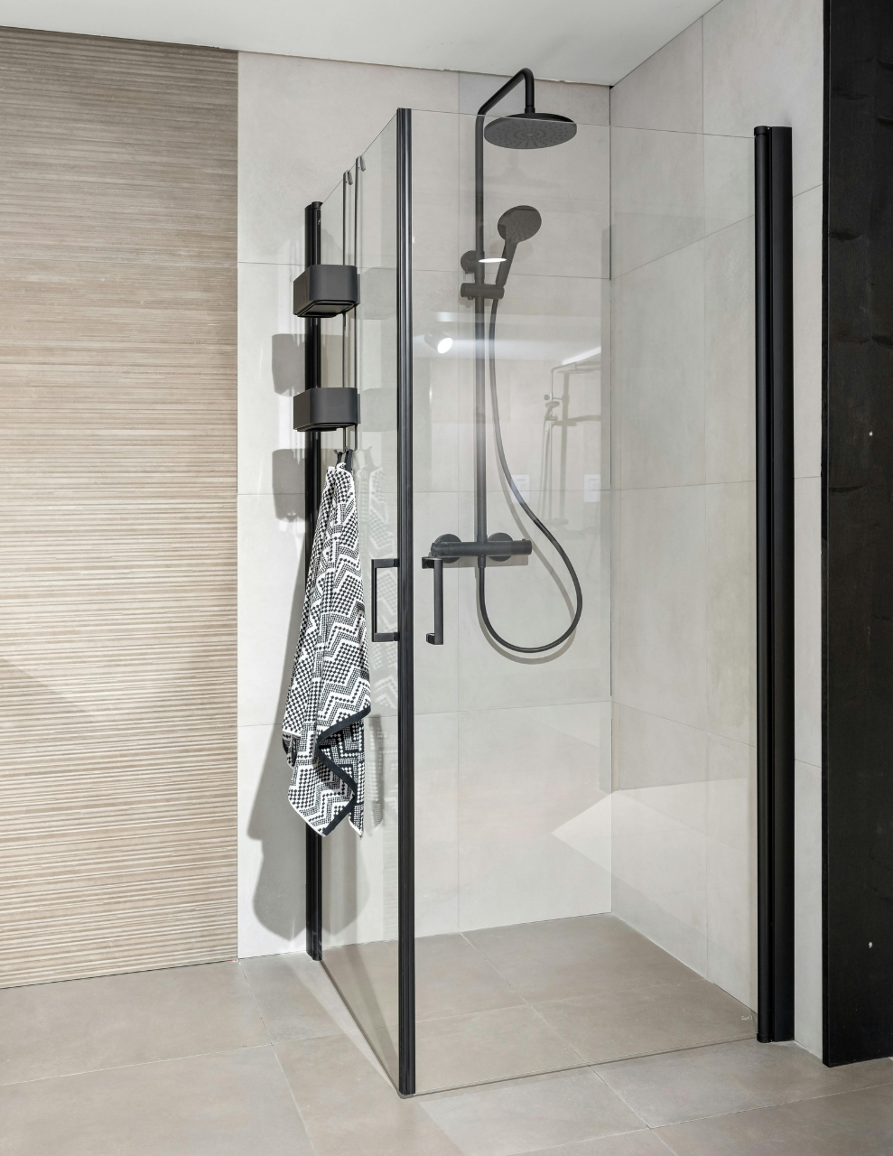 curbless walk-in shower with rainfall shower head and handheld showerhead for universal bathroom design