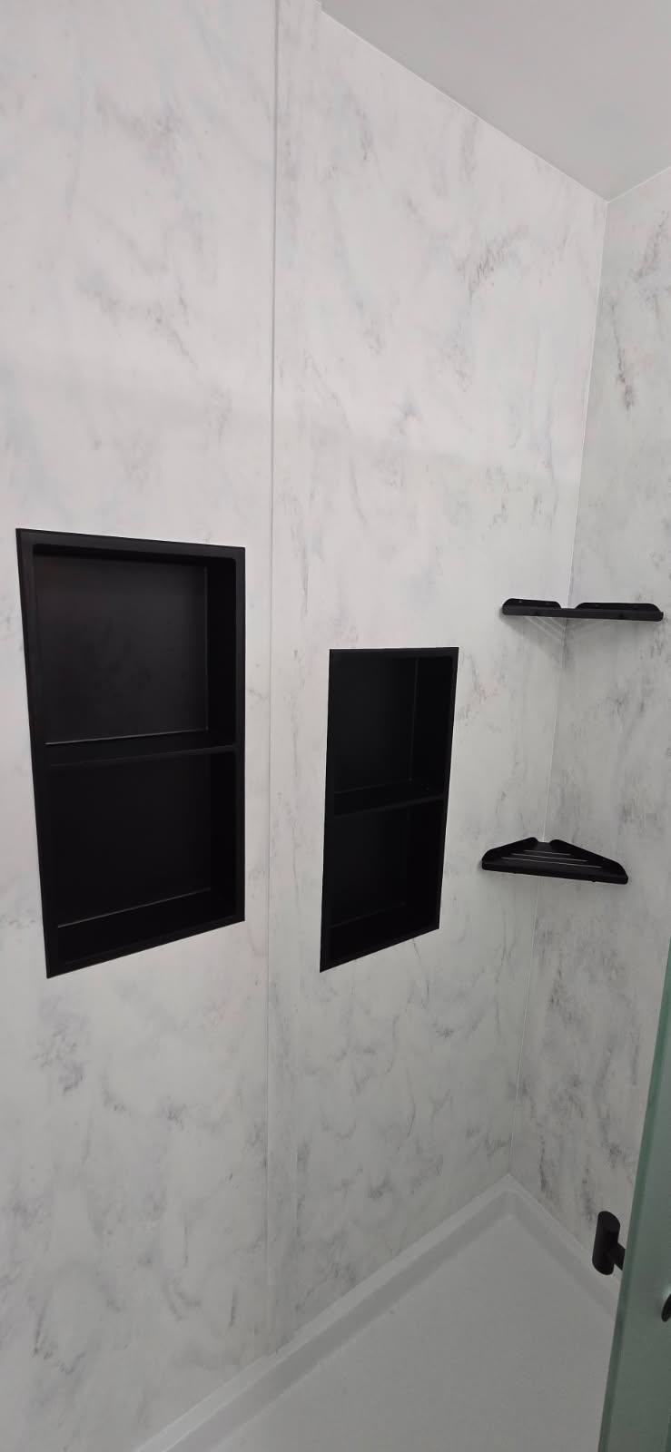 walk-in shower with groutless shower wall surround 