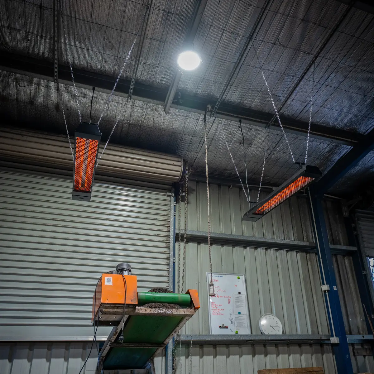 Heatstrip infrared heater hanging in the ProteaFlora potting shed