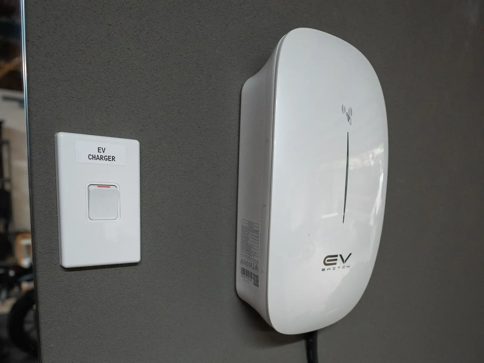 EV Switch wall charger with its isolator switch, Sassafras