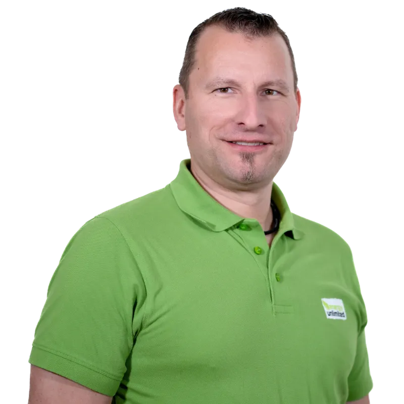Porträt Hans Pauli mit grauem lockigem Haar und einem kleinen Spitzbart.