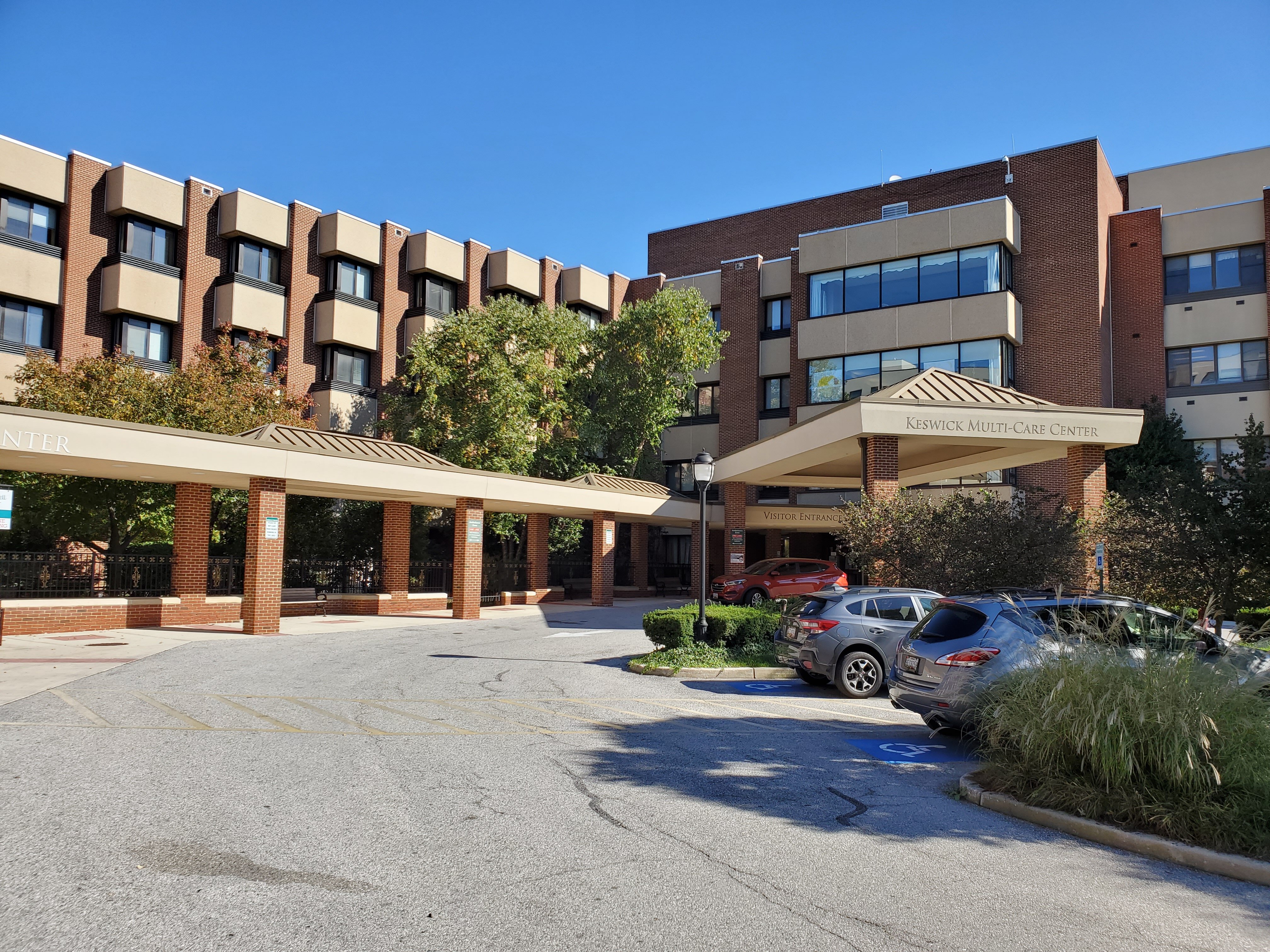 Ed Nolley on bench smiling